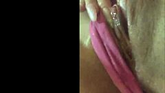 pretty mexican latina enjoying some alone time in her cozy room with toys