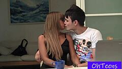 Anna and sam share a casual moment in the college dorm kitchen