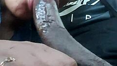 getting the car wet with shampoo in the parking lot during the rain storm with my friends watching