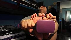 Bound toes are self-tickled in this detailed foot fetish scene with bondage elements