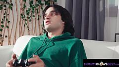 I paused my game to let stepmom suck my cock with her tattooed tits