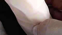 in this homemade scene, she teases her pussy with a 10-inch toy up close