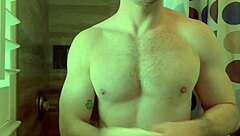 Bodybuilder Prepares For Porn Shoot