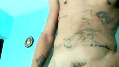 Skinny guy shows off his banana toy in the living room