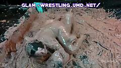 Who wins this glam mud wrestling match?