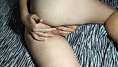 Korean cutie rubs herself through panties in close-up