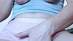 Solo girl fingers her hairy pink pussy until legs shake in orgasm.