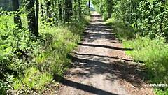 My petite girlfriend flashes in forest