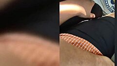 A Mature Woman In Leggings Walking Down The Street In Usa