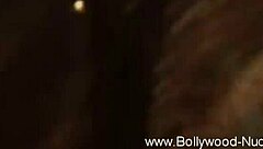 the lovely brunette dances gracefully in the room