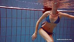 blue bikini hugs martina's tight pussy underwater suggestively