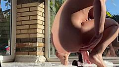 Struggling with my first huge black dildo backstage