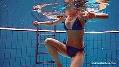 blue bikini hugs martina's tight pussy underwater suggestively