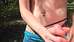 Wife gives quick handjob outdoor with pierced nipples