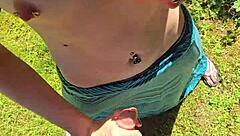 Wife gives quick handjob outdoor with pierced nipples