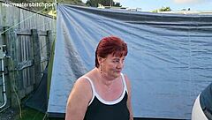 Kiwi MILF pisses outdoors at campground.