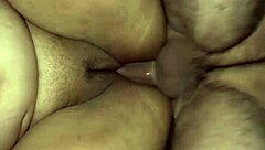 Man, eating my stepmother's pussy on all fours feels so good while pounding her hard with my cock until she moans.