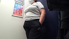 Camera Catches Curvy MILF Changing Clothes in Fitting Room, Revealing Big Ass in Satin Panties