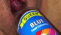 I play with my wife's swollen clit using suction.