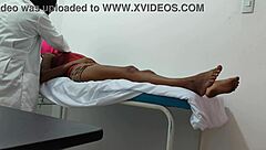 The doctor gives special attention and sensual massage to his female patient