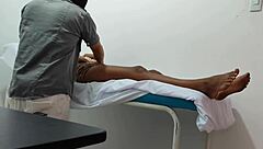 The doctor gives special attention and sensual massage to his female patient