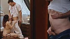 Husband watches Dr Lovegood with patient