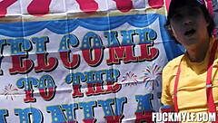 ricky faces intense wrestling with bella in carnival adventure