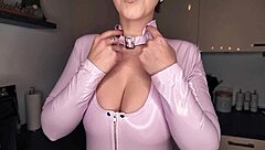 german babe in latex shows pierced nipples and tattooed ass naked