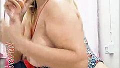 Blonde amateur shows off in hotel room.