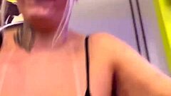 In the building gym, residents watch me exercise with my wet clothes