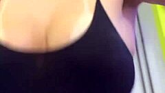 In the building gym, residents watch me exercise with my wet clothes