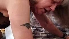 Housewife's face contorts in orgasm during homemade assfucking, her sounds echoing the intense anal pleasure.