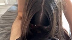 feeling the intense pleasure as teen moans during doggystyle blowjob leading to cumshot in bedroom