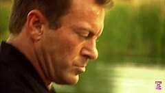 Beautiful brunette with small tits rides strong man doggystyle on boat!