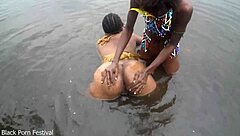 lesbian tribe duo bathing in village river sparks curiosity