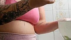 exhibitionist flashes swollen pussy in tight shorts in kitchen