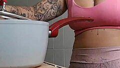 exhibitionist flashes swollen pussy in tight shorts in kitchen