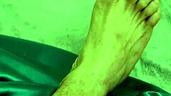 This hot guy in the USA is masturbating while wearing a chastity cage.