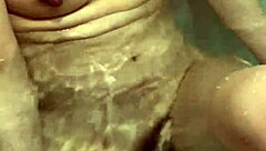 Wife washes body slowly in bath. I want to touch her nipples.