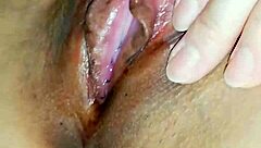 Horny Japanese slut rubs her wet cunt close up
