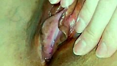 Horny Japanese slut rubs her wet cunt close up