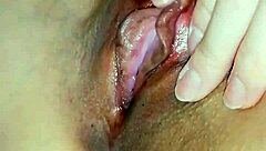 Horny Japanese slut rubs her wet cunt close up