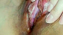 Horny Japanese slut rubs her wet cunt close up