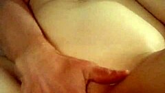 Watch this milf give a handjob, get fucked, and receive a cumshot inside her pussy