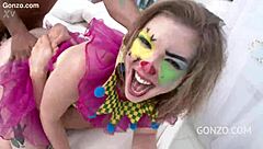 Ella Nova's rough 10on1 clown gangbang is intense!