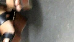 Mature Woman Hides Her Feet in Wedges and Sandals During Candid Moment