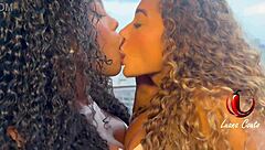 lesbian licks pussy with strap-on outdoors