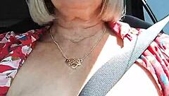 I ride down the road with my tits out