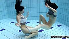 shaved brunette big tits underwater