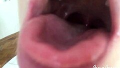 Young blonde amateur performs tongue saliva throat fetish